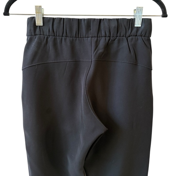 LULULEMON ON THE FLY PANTS TRAVEL WOVEN PULL ON POCKETS WORKOUT ATHLEISURE 2 - Picture 5 of 11